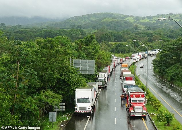 77587333-12728101-Trucks_are_see.jpg